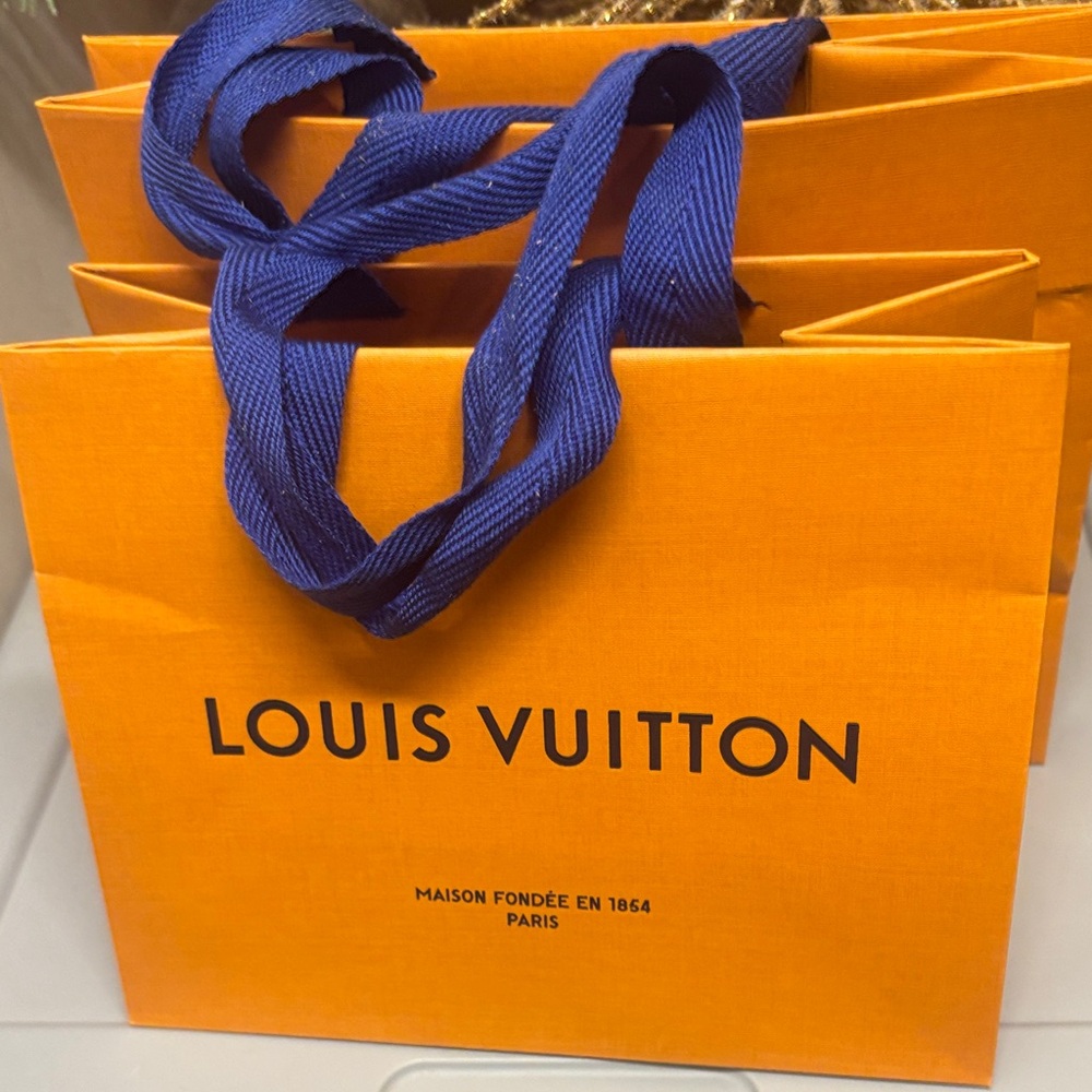 Louis Vuitton Vibrant Orange Bag with Blue Handles